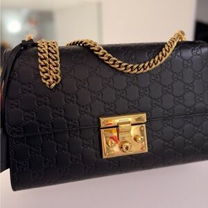 Gucci Embossed Black Shoulder Bag with Gold Hardware